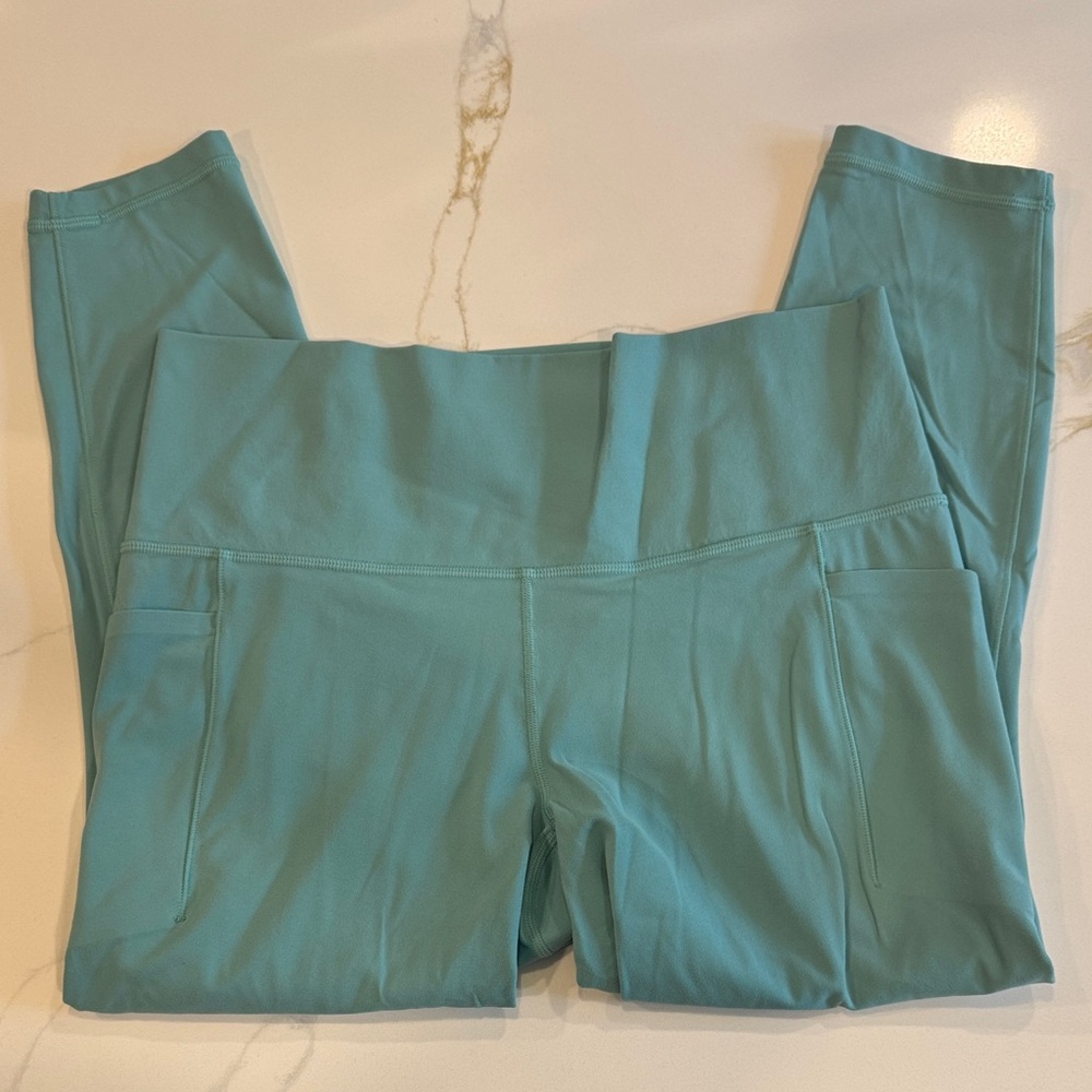 Athleta Salutation Stash 7/8 Leggings